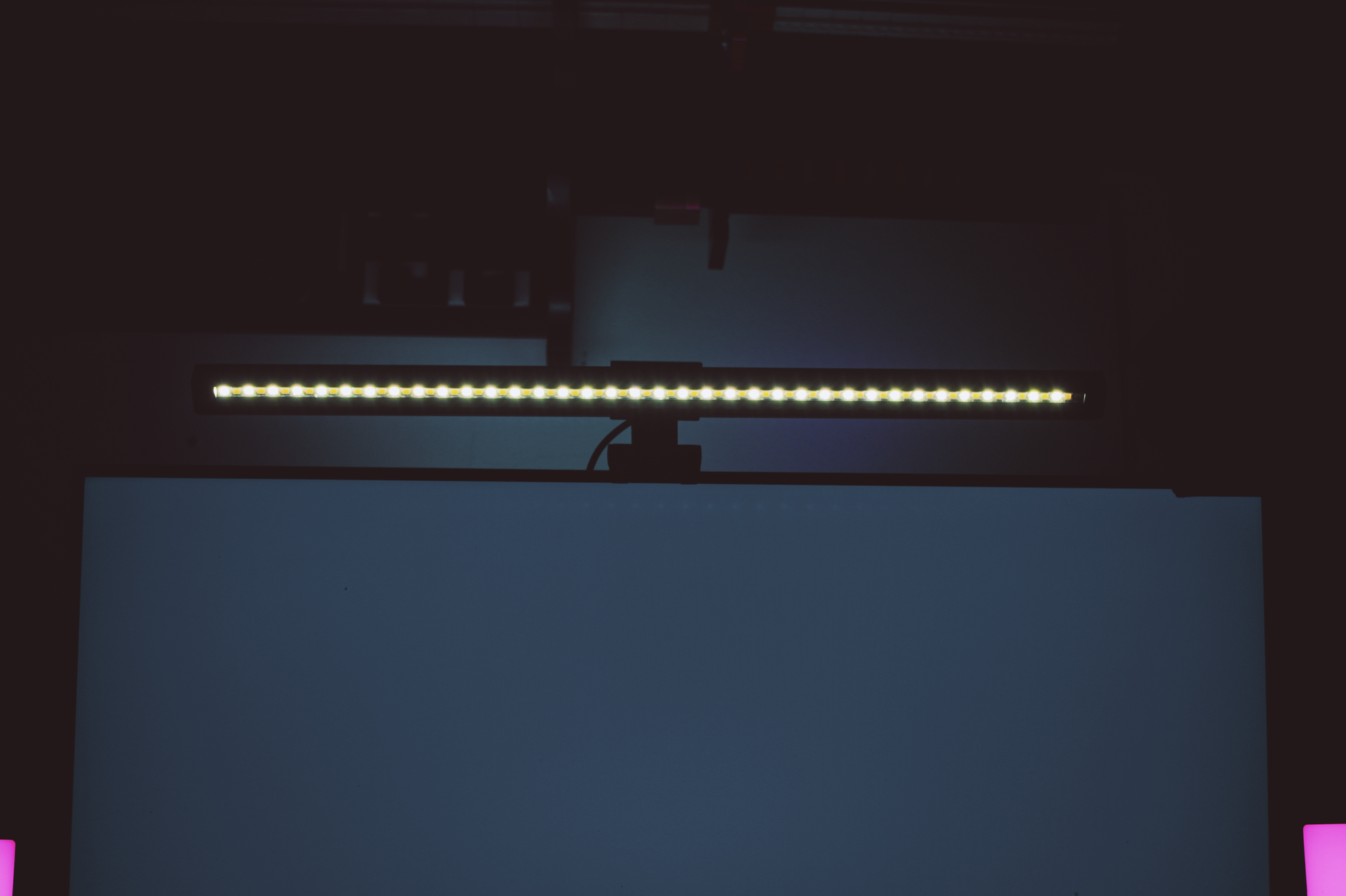 LumeScape RGB Monitor Light Bar illuminating gaming setup – purple glow