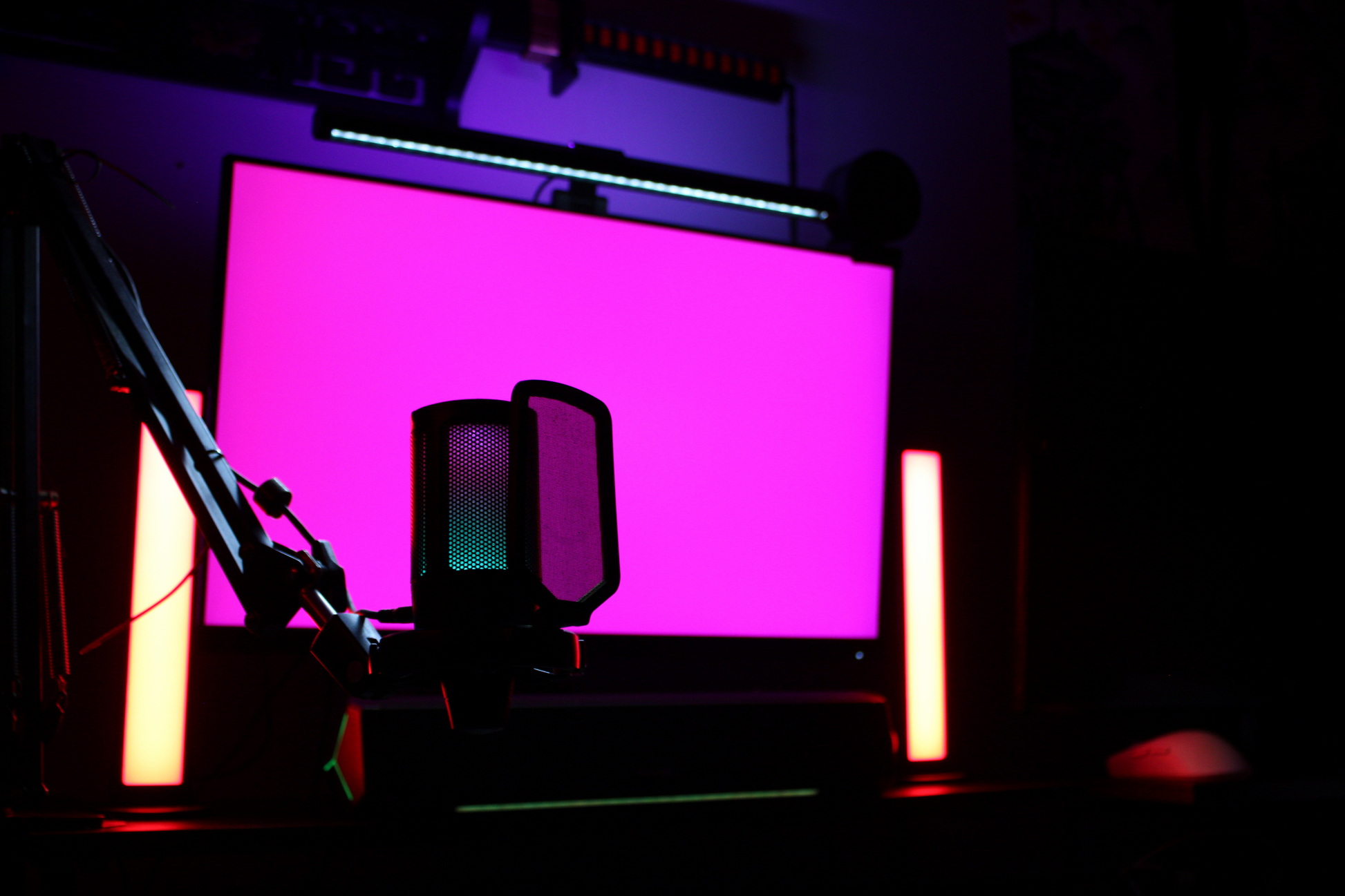 LumeScape RGB Monitor Light Bar illuminating gaming setup – purple glow