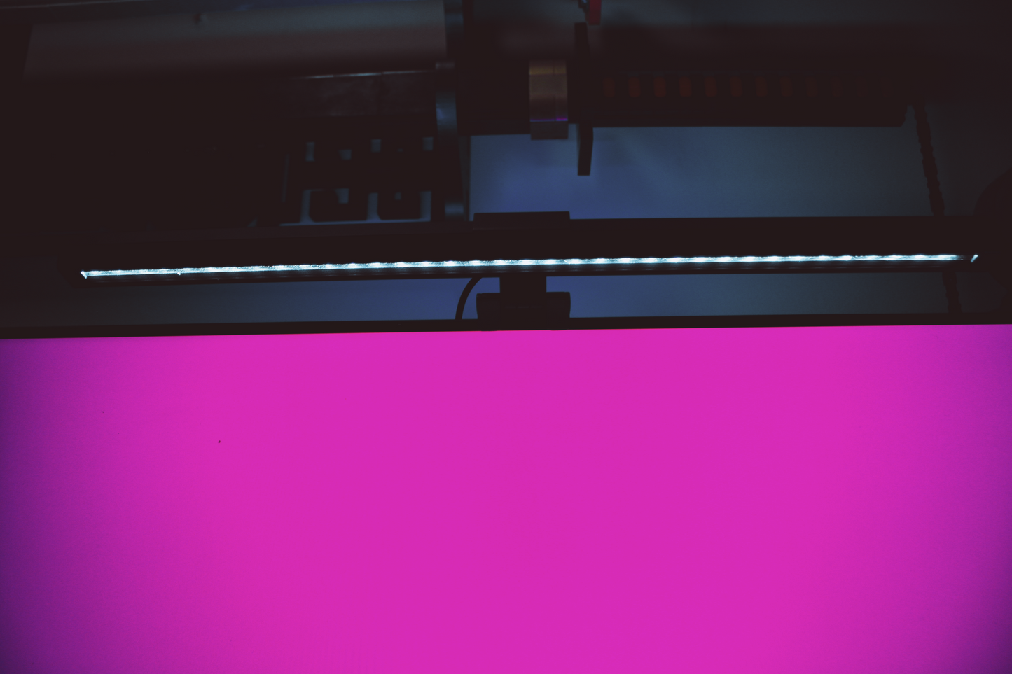 LumeScape RGB Monitor Light Bar illuminating gaming setup – purple glow